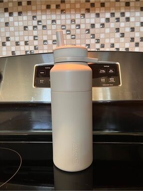 Brümate Rotera 35 OZ Cream Insulated Water Bottle with Straw Lid